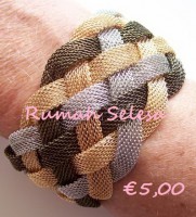 Metalen gevlochten armband met Kleuren Goud,Zilver en zwart met magneet sluiting